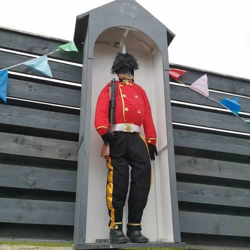 Photo Gallery Image - A Queen's Guard in his sentry  box